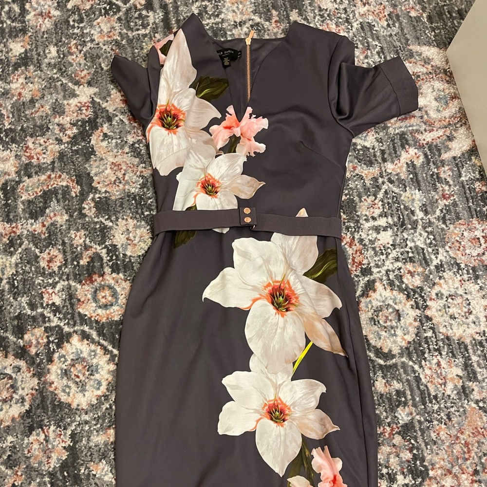 Brand new Ted Baker dress. I am 5ft comes a little below me knees. Never worn!